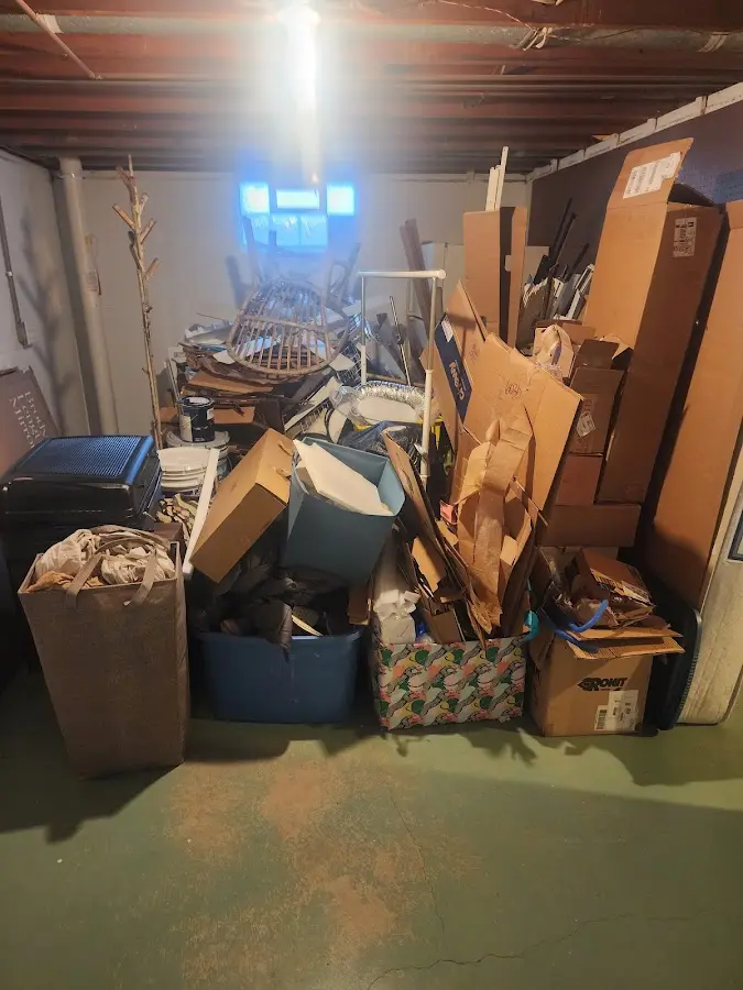 Roll-off dumpster container at job site for 20 Yard Dumpster Rental in Kinnelon